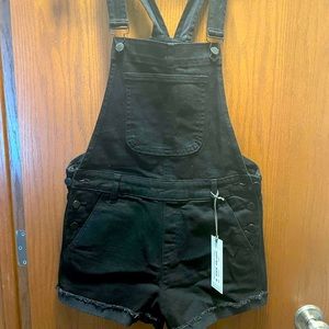 Black overall shorts size M never worn